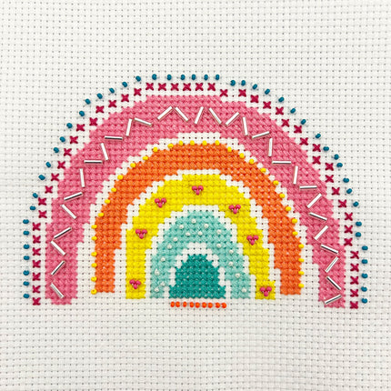 Rainbow Mini Cross Stitch Kit example with additional embellishment.