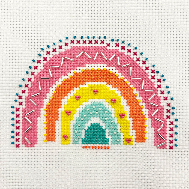 Rainbow Mini Cross Stitch Kit example with additional embellishment.