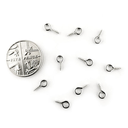 Small Rhodium Eyelets for scale