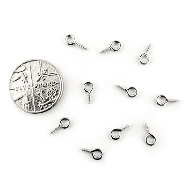 Small Rhodium Eyelets for scale